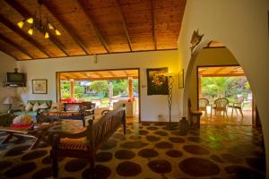 Posezení v ubytování Coté Sud - Unique Villa & Bungalows Intendance Road