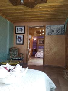 a bedroom with a bed and a room with a bed at RIAD Dar Ouezzani in Rabat