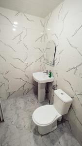 Koupelna v ubytování Central Apartment "Cozy spase"