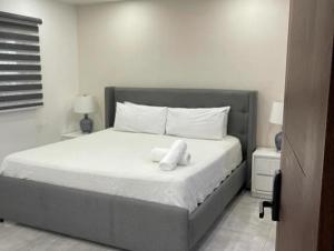 Tempat tidur dalam kamar di Apartamento acogedor de dos dormitorios