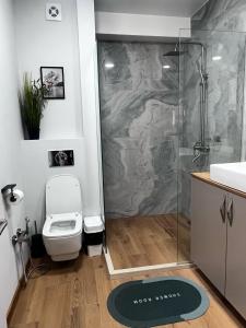Ένα μπάνιο στο Delux apartment for 6 guest, new gudauri