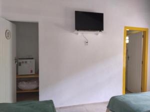 Μια τηλεόραση ή/και κέντρο ψυχαγωγίας στο Fazenda do Bosque - Pousada e Capril