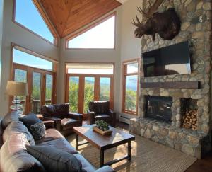 Atpūtas zona naktsmītnē C12 Homey Bretton Woods slopeside townhome for your family getaway to the White Mountains