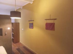 a hallway with two towels hanging on a wall at Villa F&B in Bocas Town