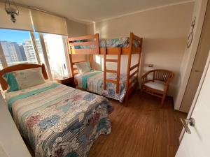 Voodi või voodid majutusasutuse Depto Laguna del Mar toas