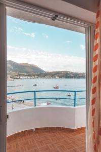 a room with a view of the water at Room with amazing sea view in Himare