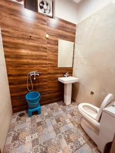 a bathroom with a toilet and a sink at The heaven(close to golden temple) in Amritsar