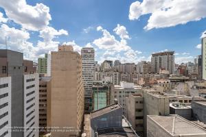 a view of a city with tall buildings at Setin Downtown Genebra by Viva - Apartamentos completos na Bela Vista com piscina in São Paulo