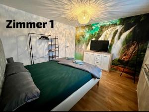 a bedroom with a waterfall mural on the wall at ZIMMERAUFZEIT in Bad Kissingen