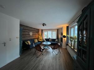 Posezení v ubytování Platell Ferienhäuser Harz Lonau
