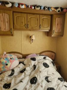 Tempat tidur dalam kamar di Martins paradise