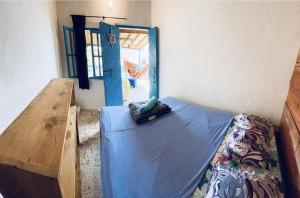 Llit o llits en una habitació de Parcerito's Hostel