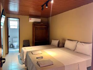 VILA LITORANEA Hotel客房内的一张或多张床位