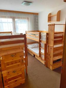 Postel nebo postele na pokoji v ubytování Apartment Eva - Hinterthal