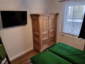 TV a/nebo společenská místnost v ubytování Haus am Soleweg