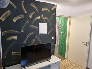 TV a/nebo společenská místnost v ubytování Haus am Soleweg