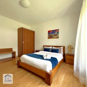 Postel nebo postele na pokoji v ubytování E&D Apartments