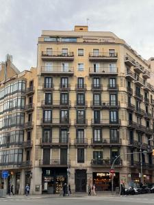 a large building on the corner of a street at Magnificent penthouse in Barcelona