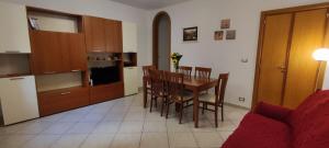 a kitchen and dining room with a table and chairs at Casa vacanza Gallipoli centro in Gallipoli