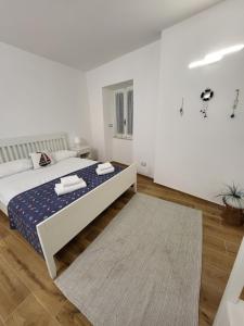 Llit o llits en una habitació de Affittacamere Il Timone
