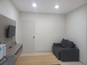 TV a/nebo společenská místnost v ubytování Apt aconchegante com 2 quartos! j