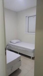 Katil atau katil-katil dalam bilik di Apt aconchegante com 2 quartos! j +3 gambar