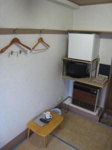 TV a/nebo společenská místnost v ubytování Asakusa Hotel Fukudaya