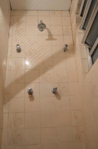 Ванная комната в Holliday Norte Hotel