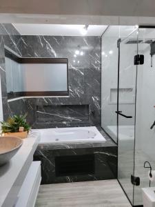 Koupelna v ubytování Suíte Máster Luxo - Lar-Doce-Mar