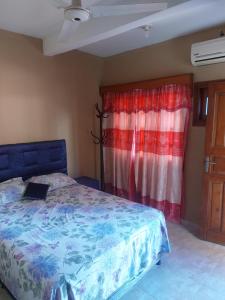 Een bed of bedden in een kamer bij Hostal Pablito