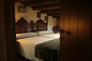 Posteľ alebo postele v izbe v ubytovaní A Casa de Filomena