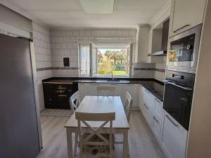 Кухня или мини-кухня в la casa de la avioneta
