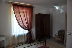 A bed or beds in a room at Res Nova Il Colle