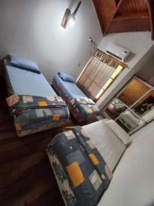 - Vistas a un dormitorio con 2 camas en San Rafael en Puerto Iguazú