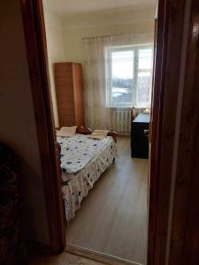 Postel nebo postele na pokoji v ubytování Mazmanyan 181