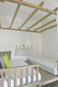Postel nebo postele na pokoji v ubytování Mantos rooms 1