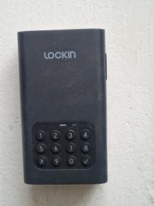 a black remote control attached to a wall at Micro-apartament NADEVA in Suceava