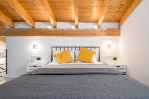 Postel nebo postele na pokoji v ubytování Windrose Apartments - Shared Pool + 37 fotografií