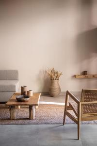 a living room with a coffee table and a couch at Nomada Chania 2 in Chania Town