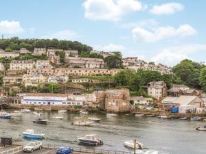 a town on a hill with boats in the water at 3 Mount Pleasant-uk36650 in Looe