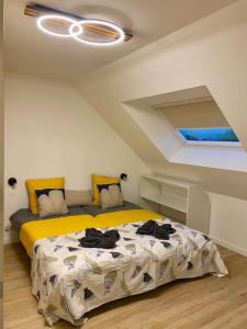 En eller flere senge i et værelse på Les Sept Îles