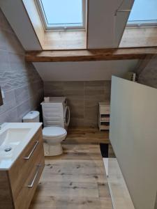Ένα μπάνιο στο Appartement Évillers