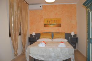 Postel nebo postele na pokoji v ubytování B&B Miracapri
