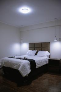 Voodi või voodid majutusasutuse PRANA HOTEL LOUNGUE BAR toas