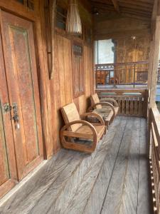 Ein Sitzbereich in der Unterkunft Pucuk Bali Homestay