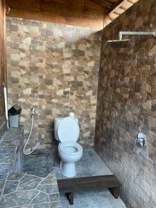 Ein Badezimmer in der Unterkunft Pucuk Bali Homestay