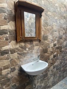 Ein Badezimmer in der Unterkunft Pucuk Bali Homestay