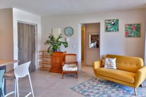 Istumisnurk majutusasutuses Charmant Appartement Topaze