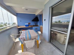 Balkón nebo terasa v ubytování Apto em Bertioga , pé na areia