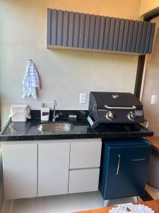 Η κουζίνα ή μικρή κουζίνα στο Apartamento aconchegante em Praia do Francês
